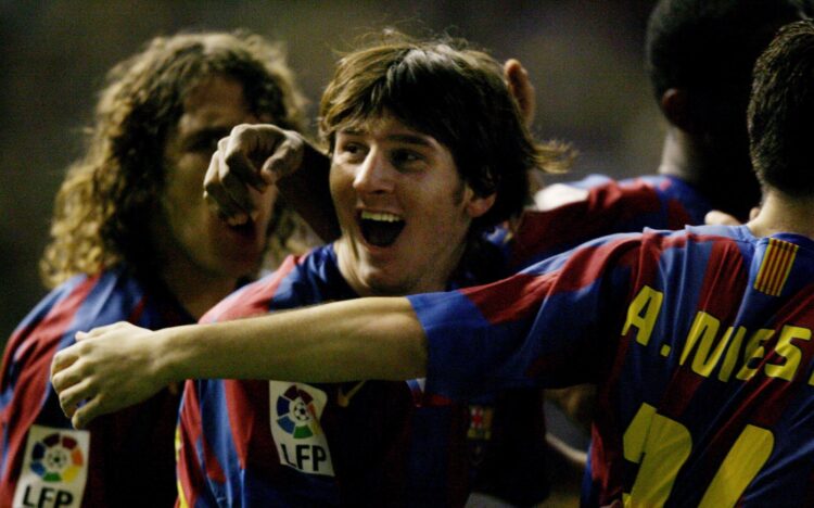 Barcelona's Lionel Messi (C)