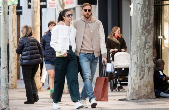 Jan Oblack and his girlfriend, Olga Danilovic, romantic stroll through the streets of Madrid