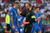 Slovenia's goalkeeper #01 Jan Oblak speaks with Slovenia's forward #11 Benjamin Sesko (L) during the UEFA Euro 2024 Group C football match between England and Slovenia at the Cologne Stadium in Cologne on June 25, 2024.,Image: 884665781, License: Rights-managed, Restrictions: , Model Release: no