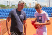 Croatia, Umag, 280723. Plava Laguna Croatia Open Umag. Emanuel Ivanisevic trains under the watchful eye of his father Go