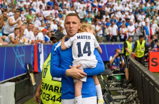 Munich, Germany, June 20th 2024: Jasmin Kurtic (14 Slovenia) with one of his kids after the UEFA EURO, EM, Europameister