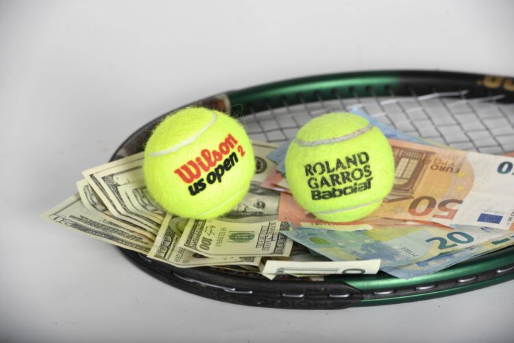 Illustration tennis and money BRUSSELS, BELGIUM - MARCH 20 : illustration picture of money and tennis on March 20, 2020