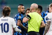 Milan, Italy. 25th Nov, 2020. Arturo Vidal of Internazionale (L) argues with Referee Anthony Taylor (R) during the UEFA Champions League Group B stage