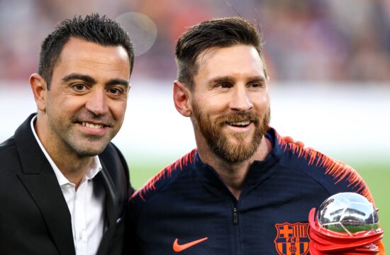 Xavi Hernandez in Leo Messi