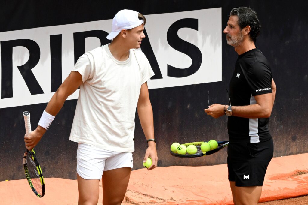 Rome, Italy. 08th May, 2024. Holger Rune of Denmark talks with his coach Patrick Mouratoglou of France during a training with Novak Djokovic of Serbia at the Internazionali BNL d'Italia 2024 tennis tournament at Foro Italico in Rome, Italy on May 8, 2024.