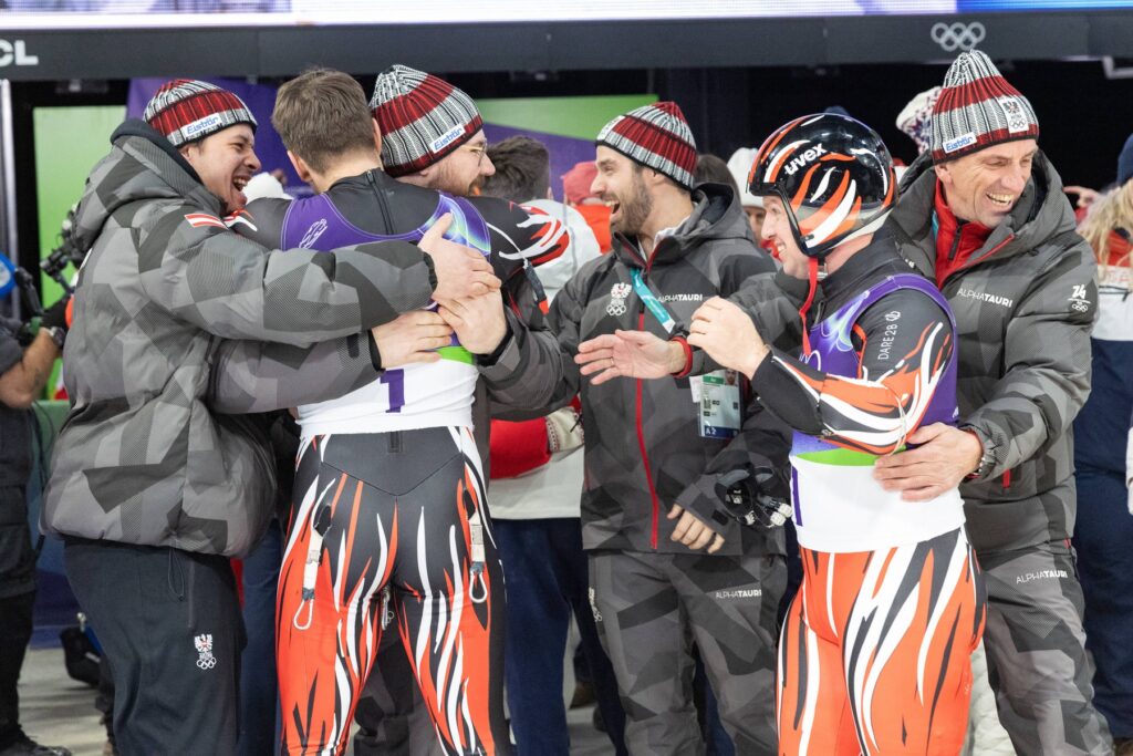 picture: Jonas Müller (AUT), Thomas Steu, Wolfgang Kindl (AUT), ÖRV President Markus Prock / 11.02.2026 / Olympic Winter
